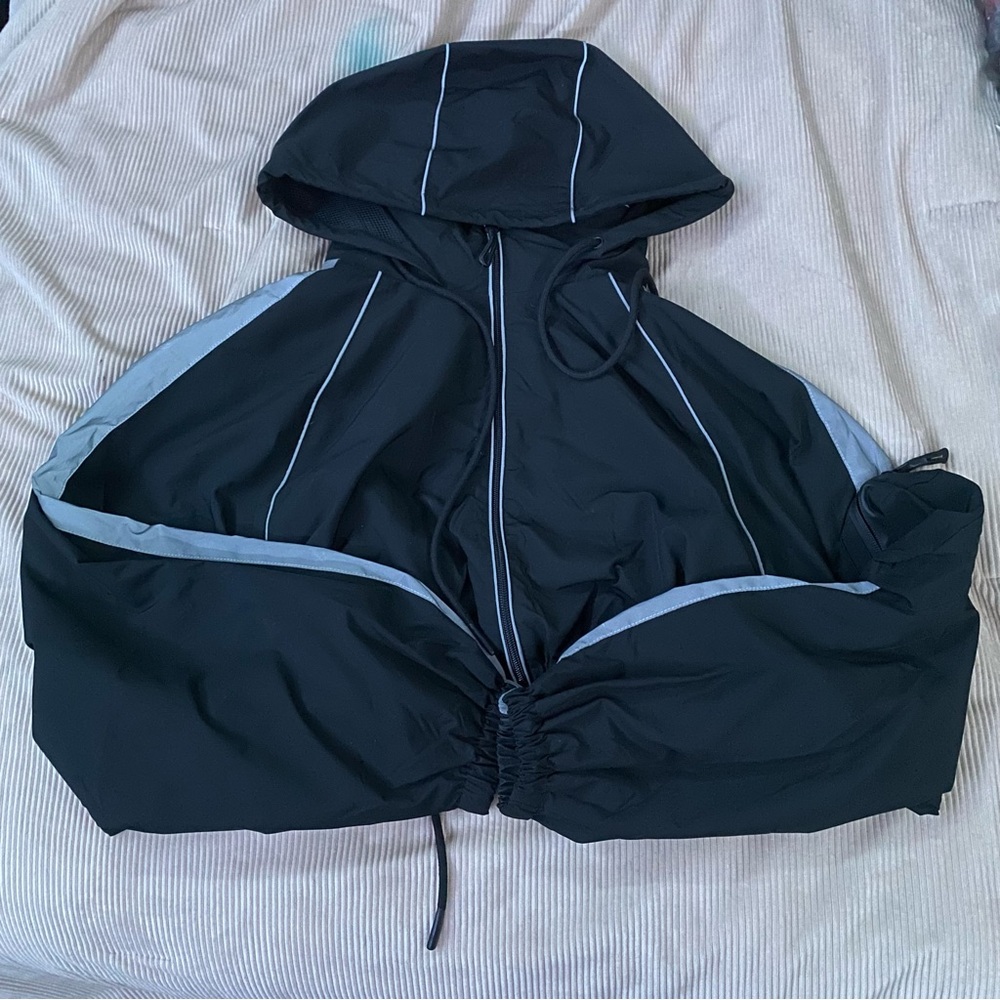 Black F21 jacket with reflective strips